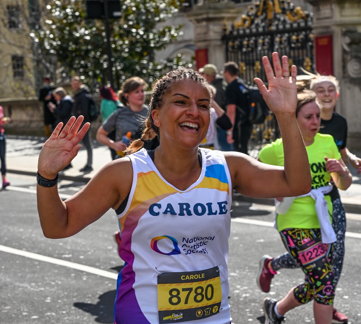 A National Autistic Society runner celebrating at the London Marathon