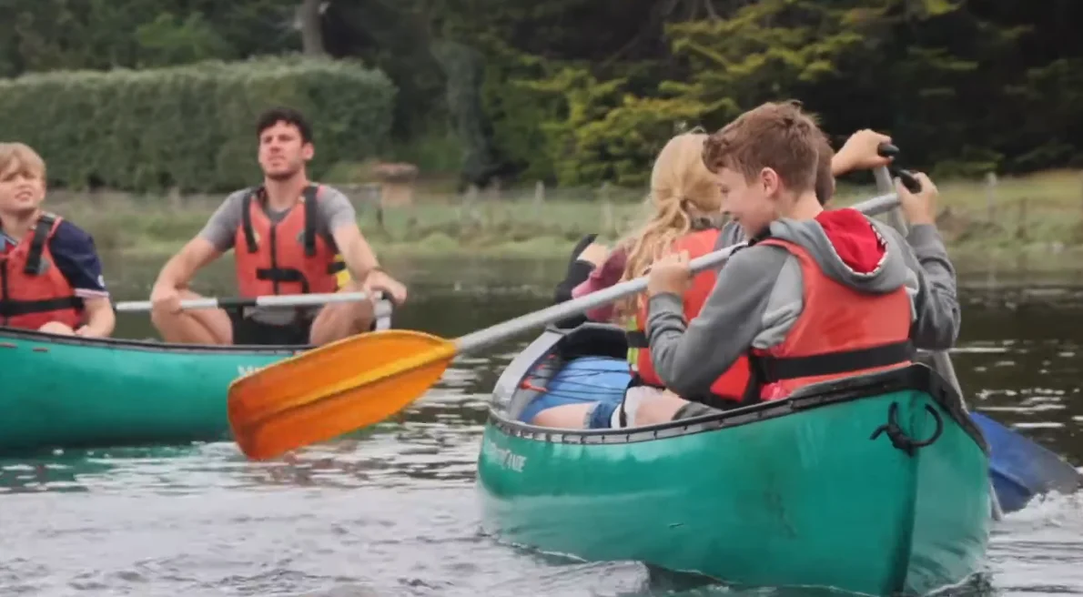 A family canoeing on the Beaulieu River