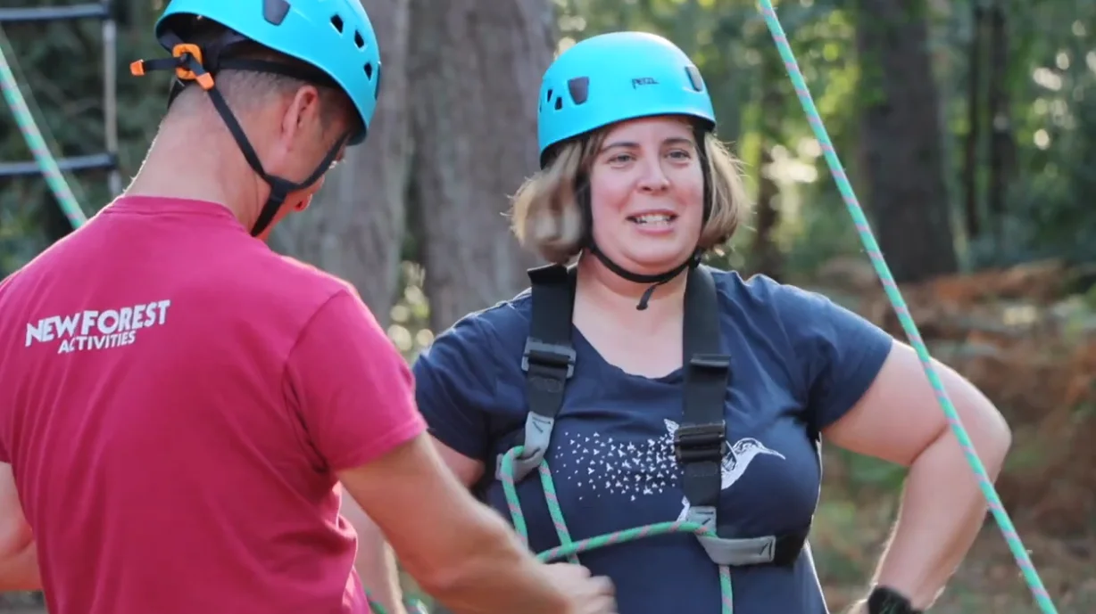 A parent on the high ropes course at New Forest Activities