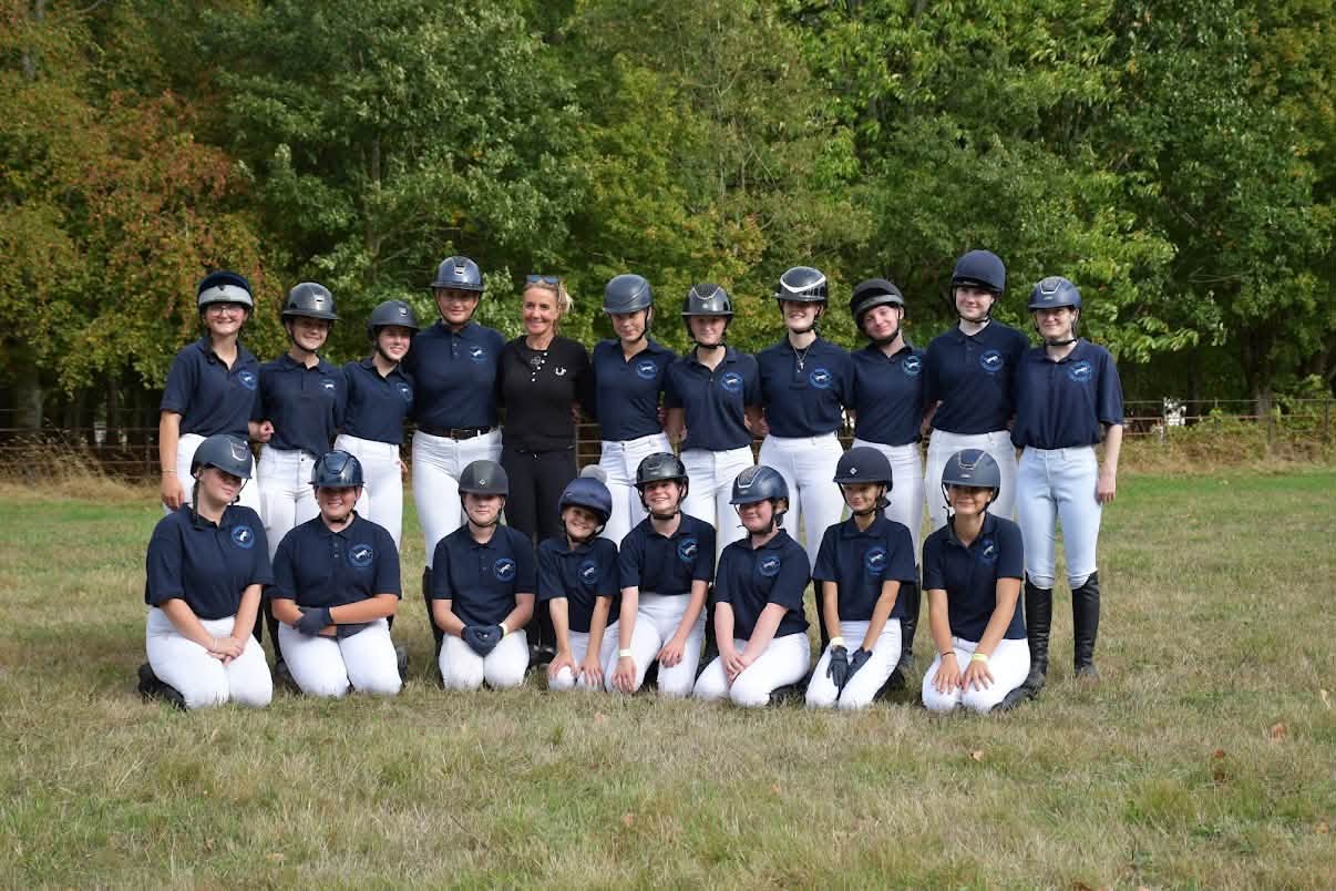 The Ampfield riders and their instructor together in matching yard colours