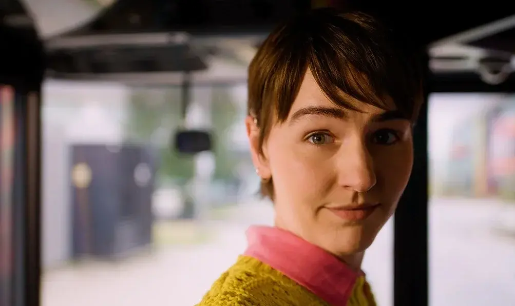 A young woman on a bus, from Scope's Don't Hold Back film